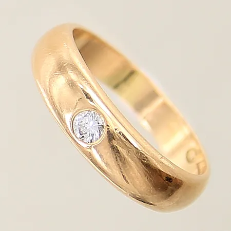 Ring med diamant ca 0,10ct stl:17¼ bredd 3,3-5,2mm 18K Vikt: 5,8 g