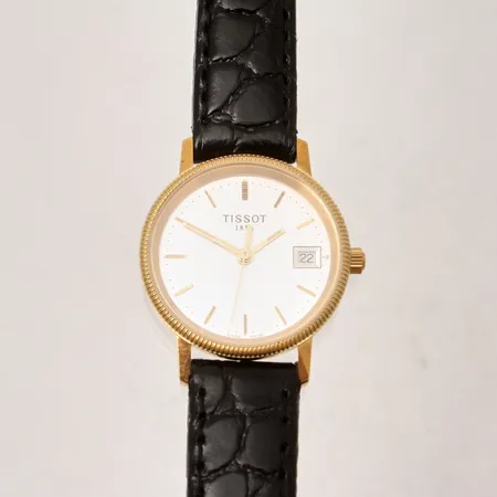 Damur Tissot i 18K guld, quartz, Ø24mm, datum, läderband, i behov a batteribyte, gravyr för nit och redlighet i rikes tjänst, inga tillbehör, 
