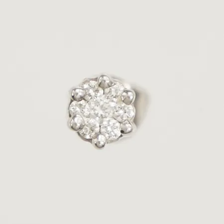 Ett udda örhänge med diamanter 7xca0,01ct Ø5mm vitguld 18K Vikt: 0,8 g