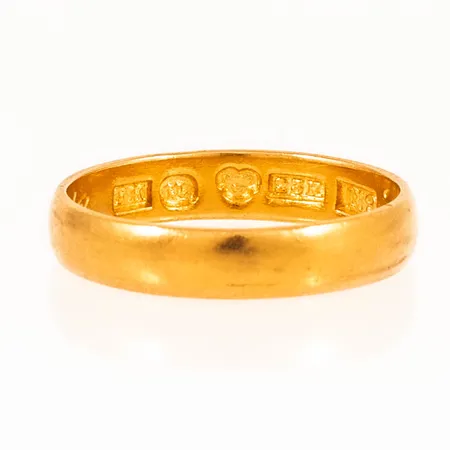Ring slät stl:18¼ bredd 4mm, gravyr, 23K 4,1g.