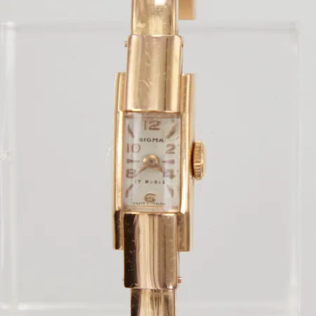 Damur Sigma manuell, går ej, integrerad armring, 18K. Bruttovikt: 11,7g