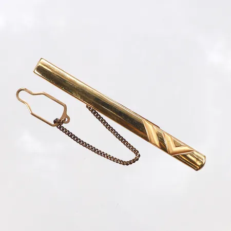 Slipsnål med mönster, framstycke i guld, bredd6mm, bruttovikt 7,3g, 18K.