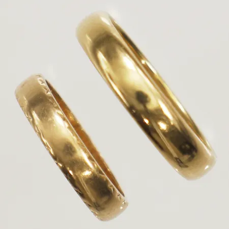 Två ringar gravyrer 18K Vikt: 9,7 g