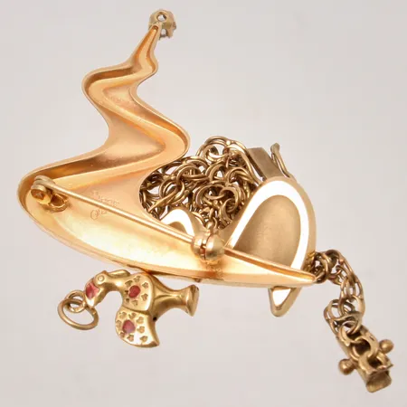 Diverse defekt guld, 18K, 10,15g.
