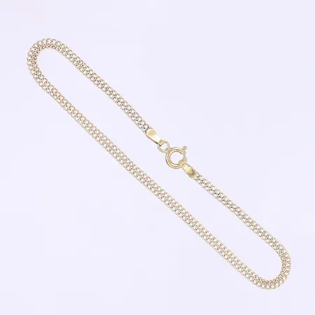 Armband flätat längd 21cm bredd 3mm något bucklig 18K Vikt: 1,7 g