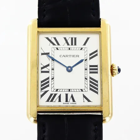 Armbandsur Cartier Tank guld 18K/stål quartz 34x25mm vit urtavla ref nr 2742 serie nr 816632LX original läderband med törnlås i guld 18K, längd 23,5cm, smärre kantnagg på glas, boett med normala bruksspår, inga tillbehör. Vikt: 0 g
