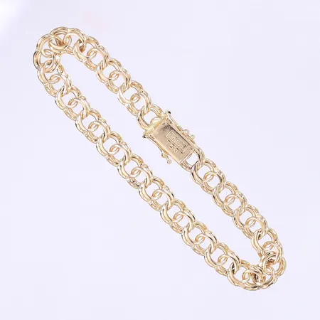 Armband Bismarck längd 19,5cm bredd 7mm kistlås GHA 18K  Vikt: 19,4 g