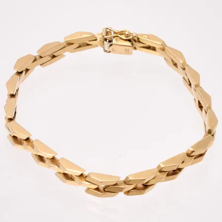 Armband i 18K guld, längd 20,5cm, bredd 6,2mm, 20,3g. 
