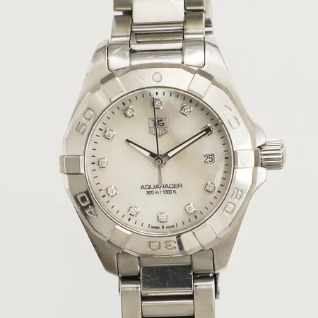 Damur Tag Heuer, Aquaracer Ø28mm, quartz, datum, stål, pärlemorurtavla med diamantindex, ref:WAY1413, snr:RZQ1346, stållänk, viklås, längd ca 18cm, repig, batteribyte behövs, inga tillbehör. 