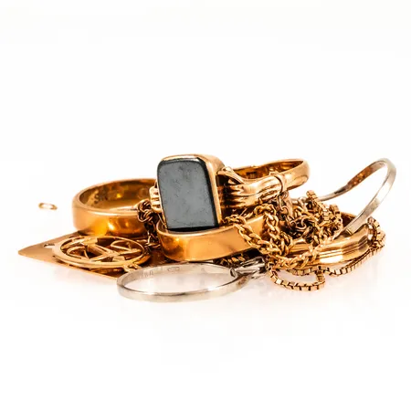 Diverse defekt guld 18K bruttovikt 40,9g
