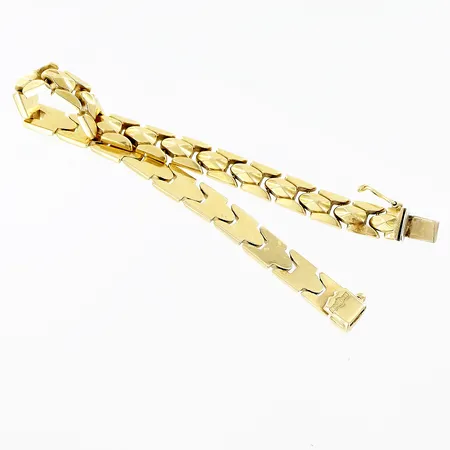 Armband längd 18,2cm bredd 7mm ihålig 18K. Vikt: 13,3 g