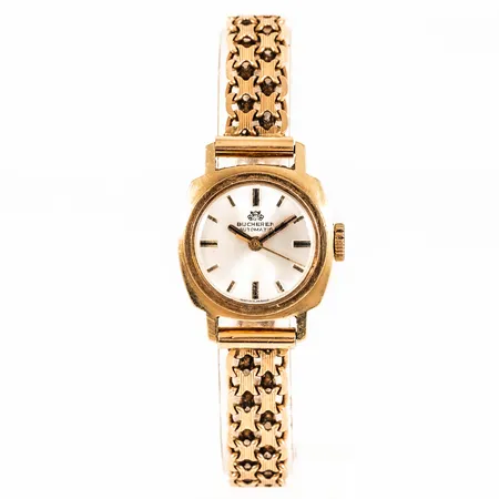 Damur Bucherer Automatic guld 18K 19,5mm plexiglas, X-länk i 18K 17-17,5cm bredd 8mm, viklås, repigt glas, gravyr. Bruttovikt: 25,2g. 