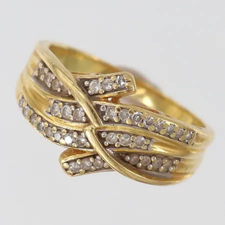 Ring med 8/8-slipade diamanter ca 38 x 0,0075ct stl:17 bredd 2-12mm GHA 18K.  Vikt: 4,7 g