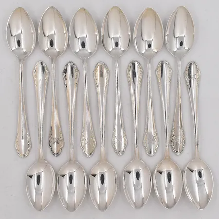 12 Kaffeskedar modell Haga längd 12,3cm delvis graverade silver 830/1000 Vikt: 183,1 g