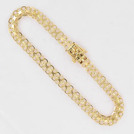 Armband X-länk längd 19cm bredd 5,8mm 18K Vikt: 7,5 g
