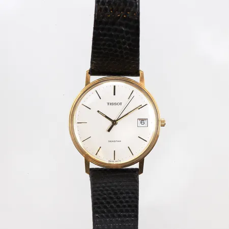 Herrur Tissot Seastar 18K, kvarts, Ø33mm, läderband, längd 23cm, spänne i doublé, gravyr, går ej, i behov av batteribyte, etui och manual.