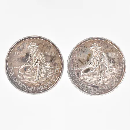 2 Mynt Ø 38,5mm The American Prospector 1986 Engelhard One Troy Ounce Fine silver 999/1000 Vikt: 62,5 g
