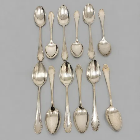 12 Skedar Haga 19cm. 830/1000 silver Vikt: 503,7 g