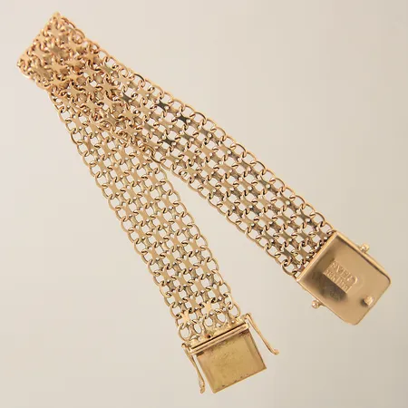 Armband X-länk längd:19cm bredd:15mm 18K  Vikt: 21,9 g