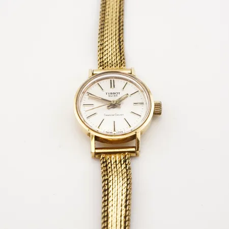 Damur Tissot, manuell, ca 22mm, 18k, gravyr bakboett, länk gulmetall
