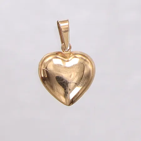 Hänge hjärta. längd 19,2mm bredd 12,1mm, mindre bucklor. 18K Vikt: 0,7 g