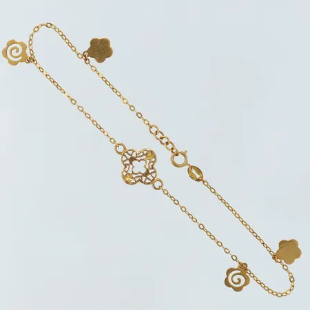 Armband med integrerade hängen blommor justerbar längd 18-19cm, bredd 10-1,3mm, 21K Vikt: 2 g på auktion i Kista hos Pantbanken Sverige