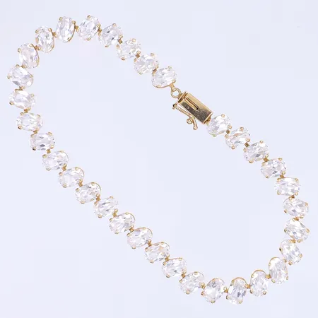 Armband med vita stenar 18,5cm bredd 6mm 14K Bruttovikt: 10,4g Vikt: 10,4 g