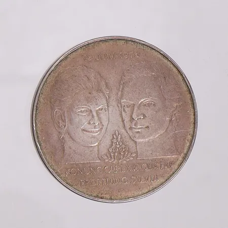 Minnesmynt 50Kr, Bröllopet mellan Konung Carl XVI Gustaf och Drottning Silvia, 19 juni 1976, Ø36mm, 925/1000 silver Vikt: 27,1 g