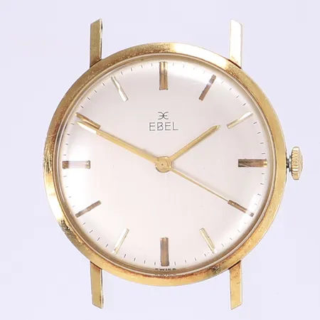 Herrur Ebel Ø33mm, manuell, 18K i boett, boettnummer 83113004/66, cal. 231S, bruksslitage, repigt plexiglas, fungerande men ej testad för tidshållning, utan band, med tag, inga övriga tillbehör Vikt: 0 g