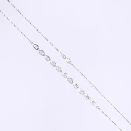Halscollier med diamanter 11x ca 0,005ct 43/46cm bredd 1-4,5mm, något bucklig, vitguld 18K Vikt: 3,3 g