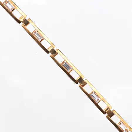 Armband med vita stenar, längd:18cm, bredd:6mm, 18K. Vikt: 13,2 g