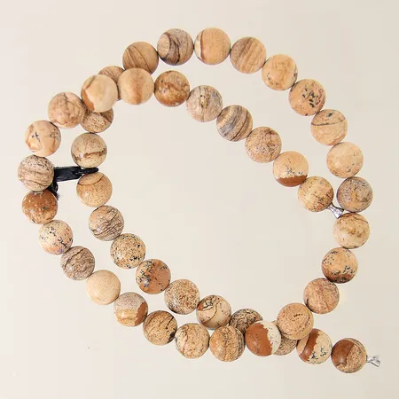 Collier Ole Lynggaard med bildjaspis Ø10,0-10,3mm längd 47,5cm inklusive dobbar, etikettmärkt