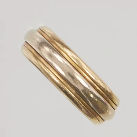 Ring tvåfärgad stl:18 bredd:6,6mm 18K 6,9g.