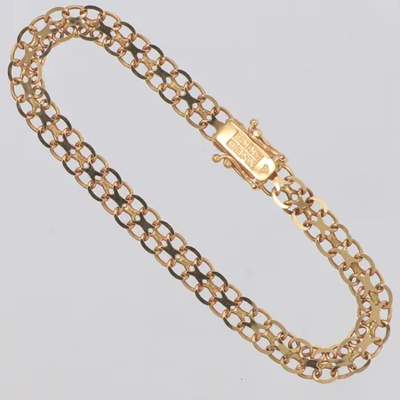 Armband X-länk längd 18cm, bredd 6mm, N S E Guldvaru Aktiebolag Köping 1984, 18K Vikt: 7,6 g