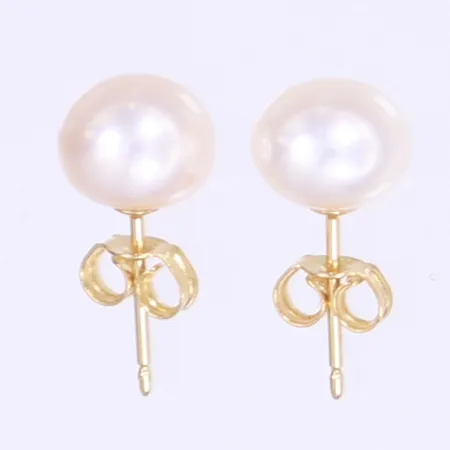 Ett par örhängen med pärlor 15x7mm 14K Bruttovikt: 1,1g Vikt: 1,1 g