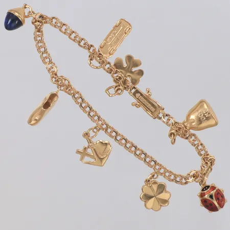 Armband Bismarck med 8 berlocker, längd 18,5cm, bredd 3,6mm, Köping 1966, 18K  Vikt: 12,5 g