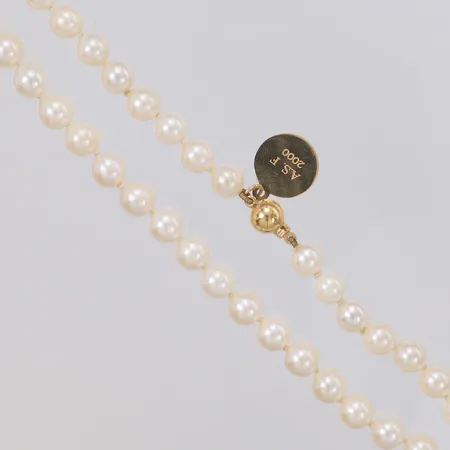 Pärlcollier odlade pärlor Ø6,5-6,9mm, längd 46cm, guldlås och berlock 18K, gravyr. Vikt: 0 g