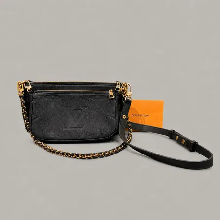 Väska Louis Vuitton Multi Pochette Accessories, svart monogram empreinte läder, M90399, datumkod TA0261, höjd ca 14,5cm bredd ca 24cm, samtliga delar avtagbara, beslag i gulmetall med färgbortfall, bruksslitage, kvitto från Birger Jarlsgatan 2021, dustbag.