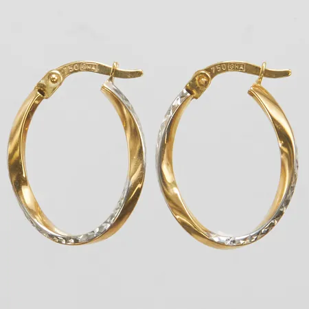 Ett par örhängen creoler, längd ca 21mm, bredd 15,5mm, bredd 2mm, tvåfärgade, 18K Vikt: 1,2 g