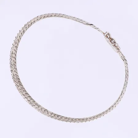 Armband 17,5cm bredd 6mm något ojämn 925/1000 silver Vikt: 7,1 g
