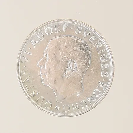 Mynt Gustaf VI Sveriges Konung 1882-1972, 10kr Ø32mm, silver 835/1000 Vikt: 18,1 g