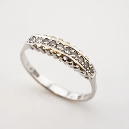 Ring m diamanter 0,20ct enligt gravyr, vitguld, stl 19½(62), bredd 4mm, 18k Vikt: 2,5 g