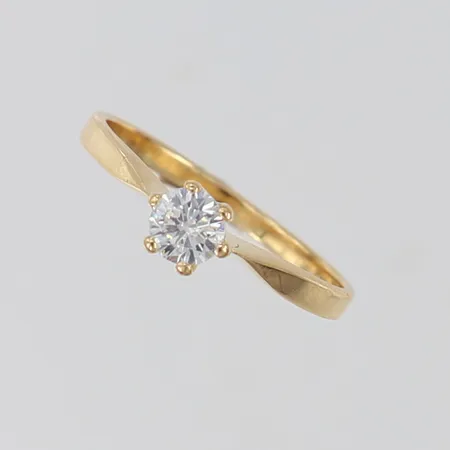 Ring med diamant 1 x 0,23ct, stl:16½, bredd 4,5mm, 18K OBS! Ändrat Pris! Vikt: 1,9 g