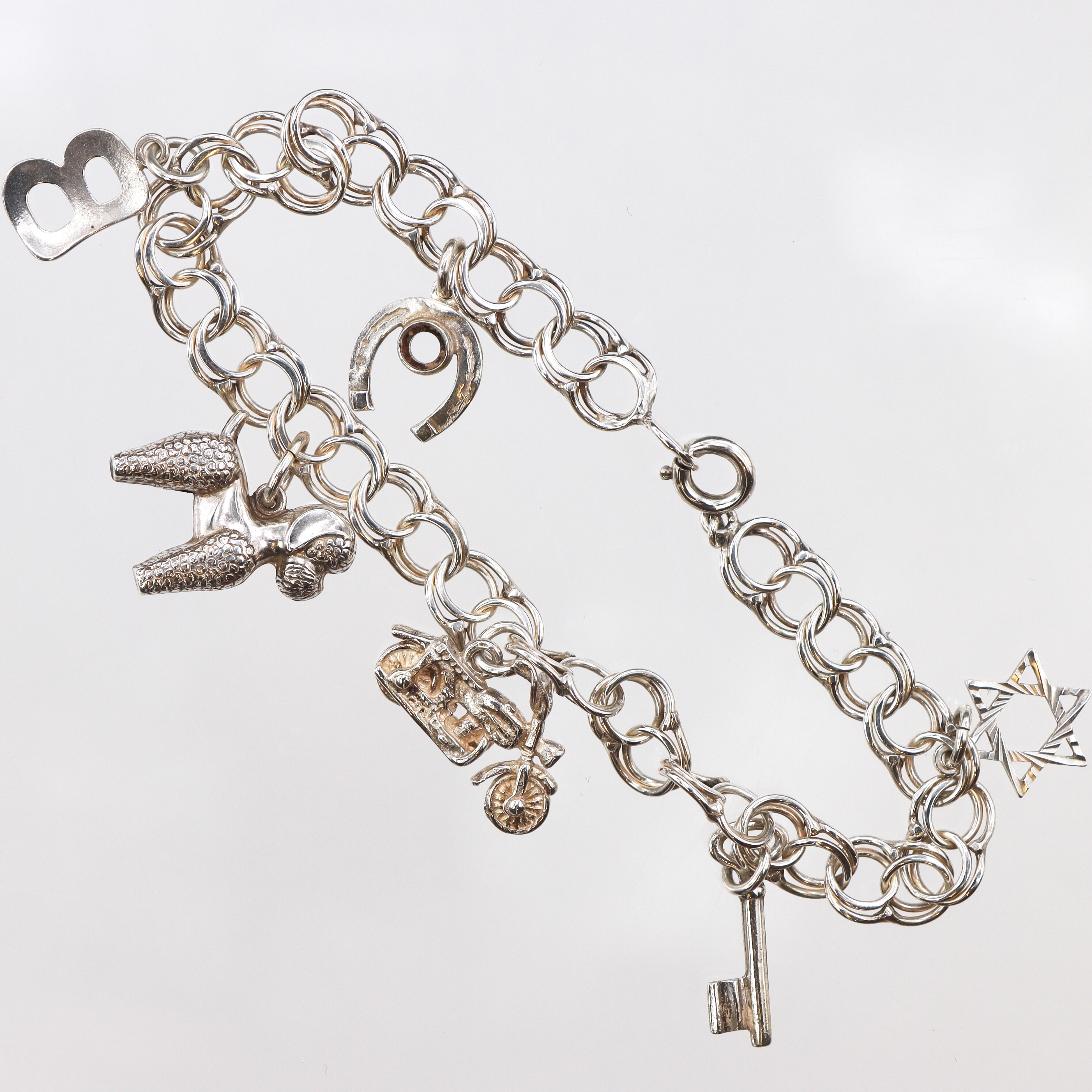 Armband Bismarck med 6 berlocker, 20cm, bredd: 7,2mm, 830/1000 silver Vikt: 12,9 g