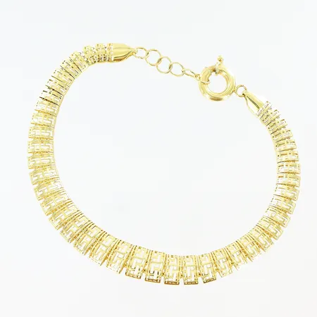 Armband längd 18-20cm bred 5-9mm 18K.  Vikt: 8,3 g