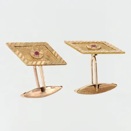 Ett par manschettknappar med stenar troligen rubiner, ca 16,5x28mm, 14K Vikt: 7,7 g