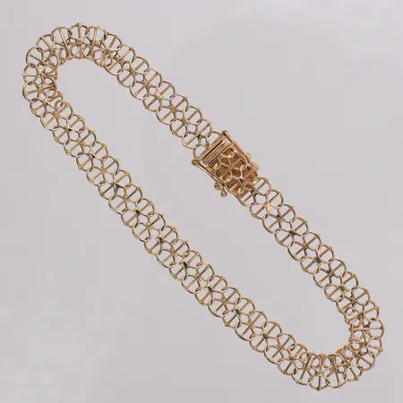 Armband X-länk längd 19,5cm, bredd 7mm, GHA. 18K Vikt: 7,2 g