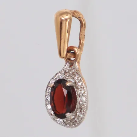 Hänge med röd sten och diamanter 14x ca 0,005ct längd 17,8mm, tvåfärgad, 14K  Vikt: 0,9 g