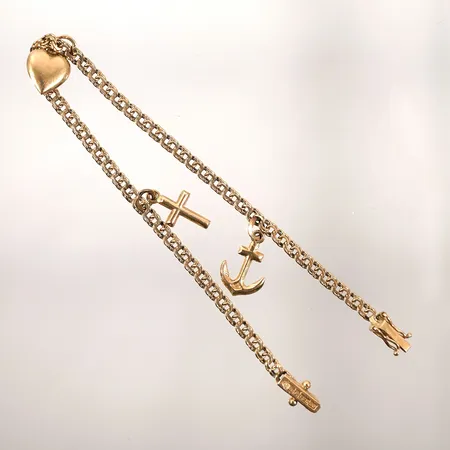 Armband Bismarck med berlocker längd 18,5cm bredd 3mm 18k Vikt: 5,2 g