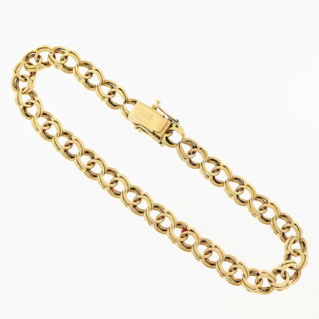 Armband Bismarck längd 22,5cm bredd 7mm slitage på länk, lås behöver justeras, 18K. Vikt: 17,9 g